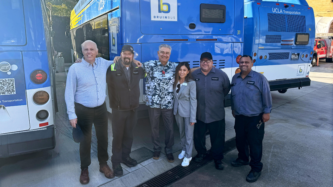 Leadership visiting the Events & Transportation bus fleet