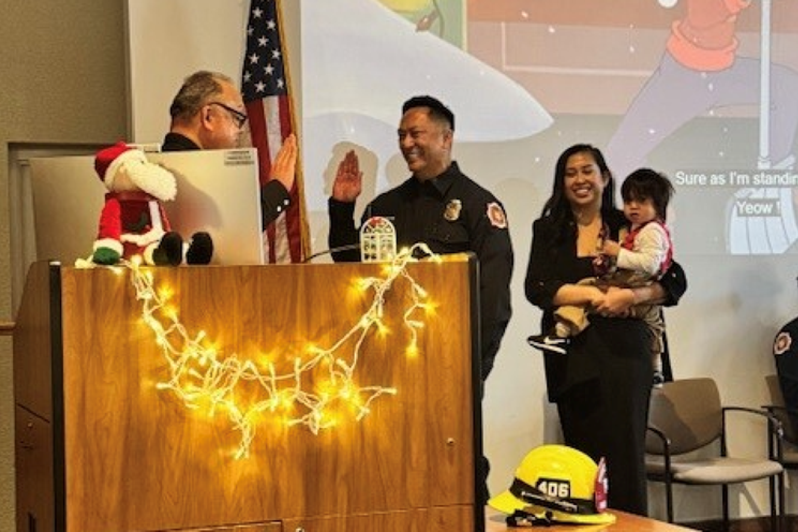 Mark Silvestre being sworn in as deputy fire marshal