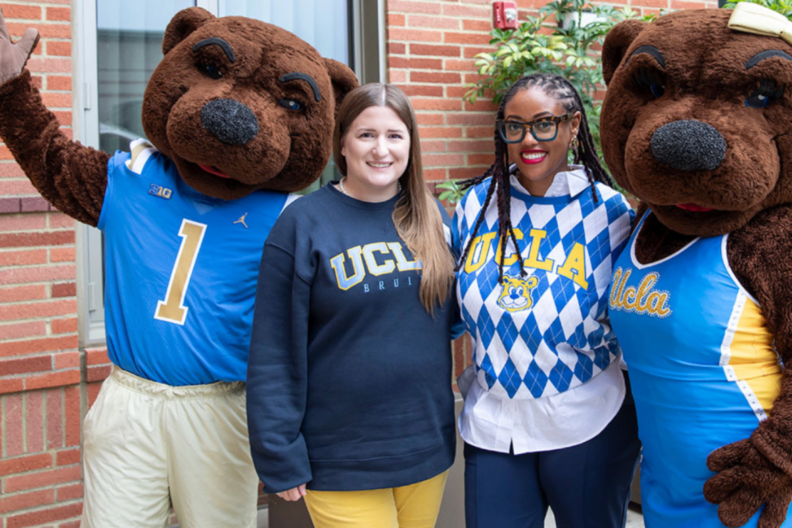 Joe and Josie Bruin with staff