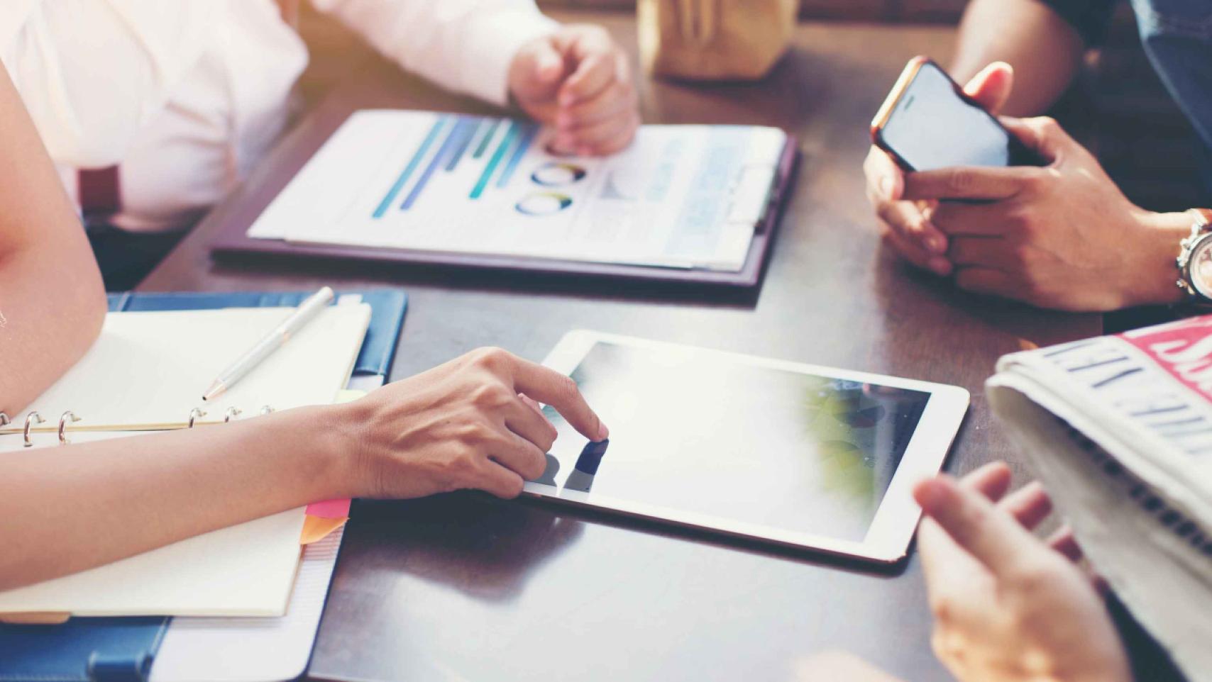 administration members meeting to discuss strategic initiatives