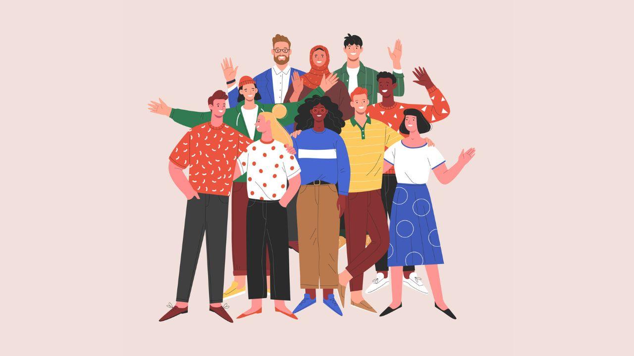 A diverse group of people standing together happily