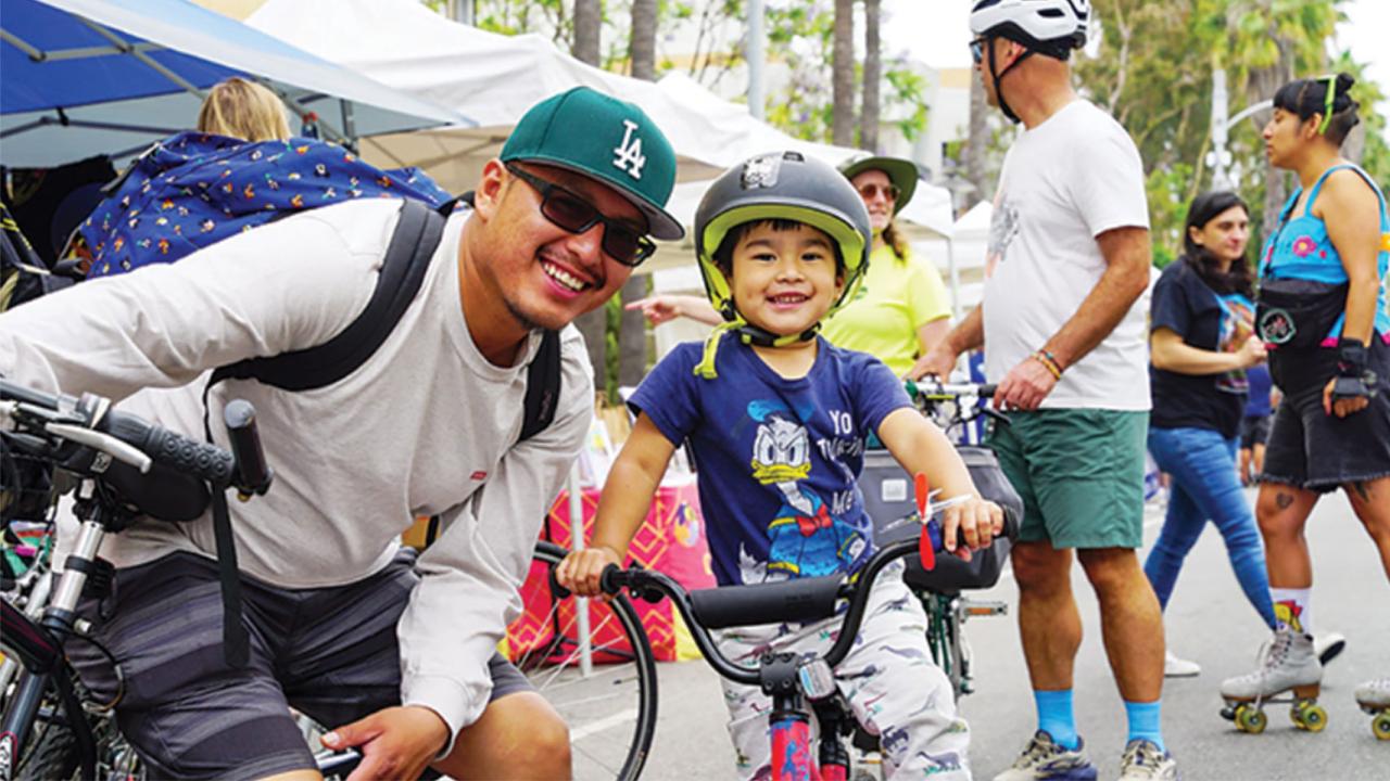 Los Angelenos enjoy some fun at an inclusive street fair