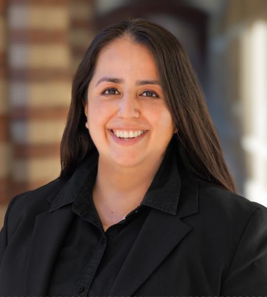 Headshot of Lizett Martinez, standing in the Royce Hall colonnade. 