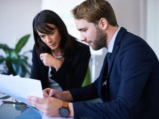 Two business associates working together