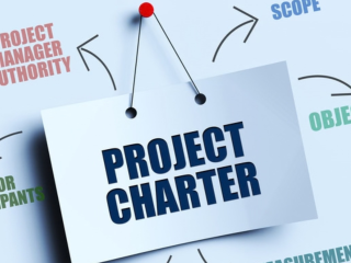 Project Charter posted to a pin board