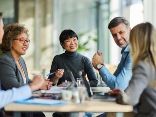 Group of workers in an office meeting