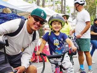 Los Angelenos enjoy some fun at an inclusive street fair